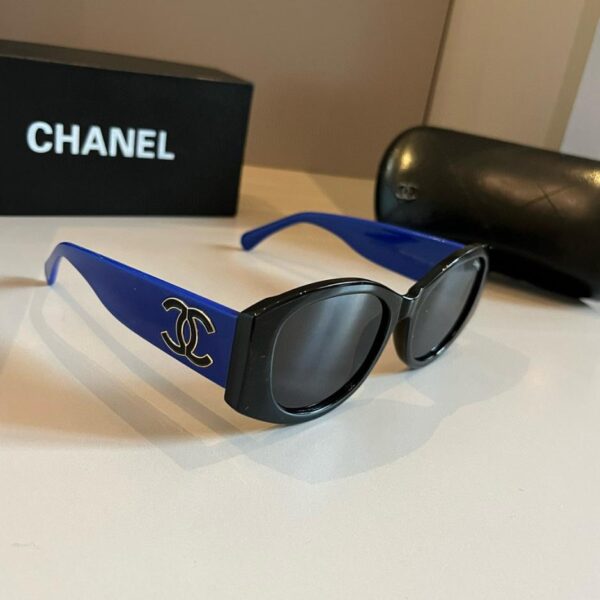 replica,repliche,fake,1:1,earrings,bracelet,ring,jewelry Occhiali da sole panda Chanel bianchi e neri