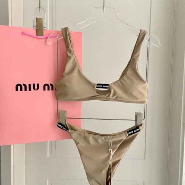 replica,repliche,fake,1:1,earrings,bracelet,ring,jewelry Nuovo costume intero diviso di Miu Miu