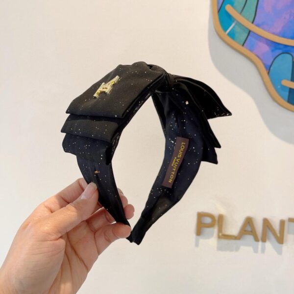 replica,repliche,fake,1:1,earrings,bracelet,ring,jewelry Nuova fascia per capelli con fiocco largo di Louis Vuitton