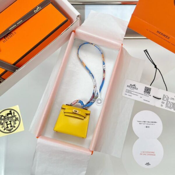 replica,repliche,fake,1:1,earrings,bracelet,ring,jewelry Borsa HERMES mini Kelly (giallo ambra) ciondolo kelly twilly