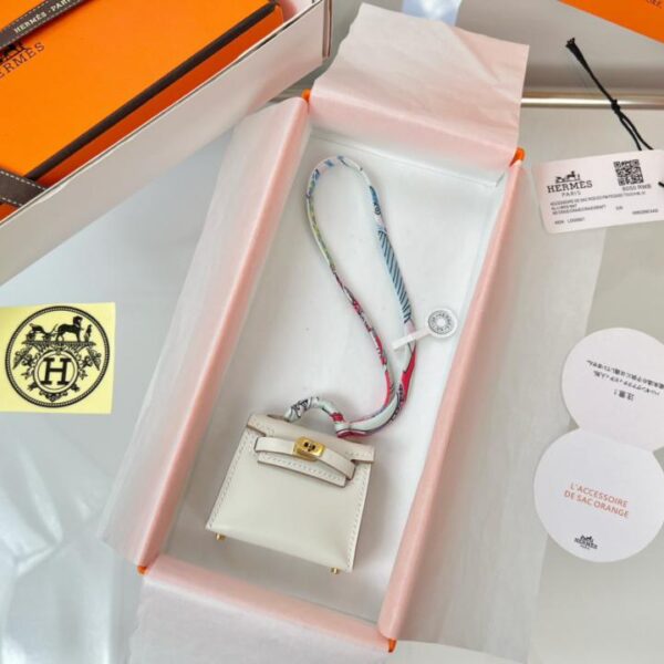 replica,repliche,fake,1:1,earrings,bracelet,ring,jewelry Borsa HERMES mini Kelly (bianco gesso) ciondolo kelly twilly