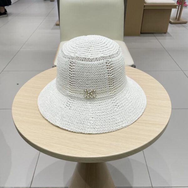 replica,repliche,fake,1:1,earrings,bracelet,ring,jewelry Cappello da sole di alta qualità di alta qualità di vendita calda di Chanel cappello da pescatore vuoto cappello di paglia da viaggio estivo a cupola