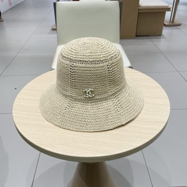 replica,repliche,fake,1:1,earrings,bracelet,ring,jewelry Cappello da sole di alta qualità di alta qualità di vendita calda di Chanel cappello da pescatore vuoto cappello di paglia da viaggio estivo a cupola