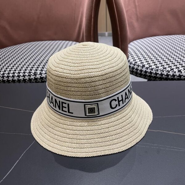 replica,repliche,fake,1:1,earrings,bracelet,ring,jewelry Cappello a secchiello traspirante estivo da donna Chanel a tesa larga con protezione solare, cappello di paglia da mare