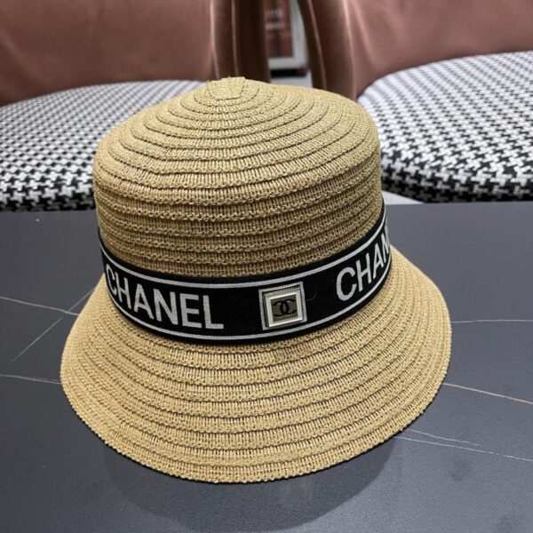 replica,repliche,fake,1:1,earrings,bracelet,ring,jewelry Cappello a secchiello traspirante estivo da donna Chanel a tesa larga con protezione solare, cappello di paglia da mare