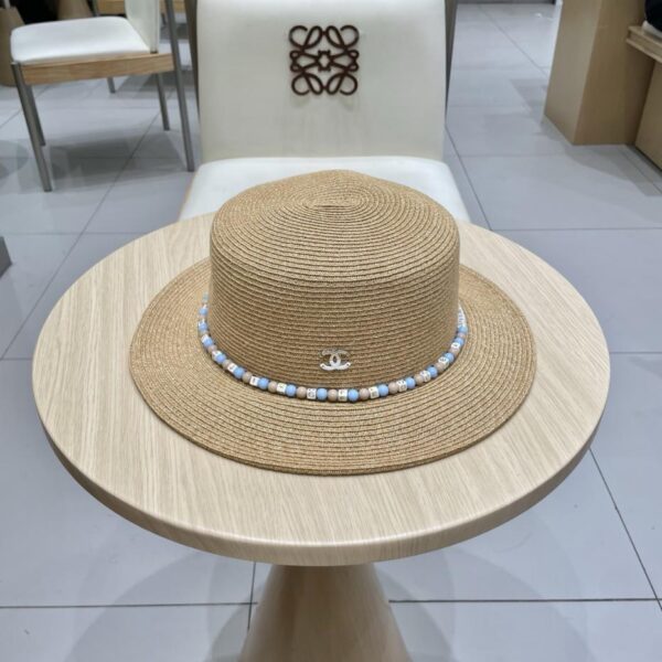 replica,repliche,fake,1:1,earrings,bracelet,ring,jewelry Il nuovo cappello di paglia in stile etnico di Chanel, tendenza della moda estiva da donna, cappello di protezione solare per esterni