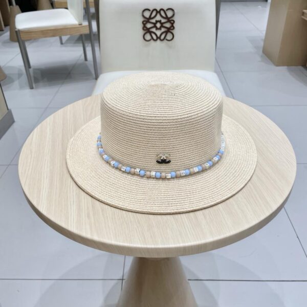 replica,repliche,fake,1:1,earrings,bracelet,ring,jewelry Il nuovo cappello di paglia in stile etnico di Chanel, tendenza della moda estiva da donna, cappello di protezione solare per esterni