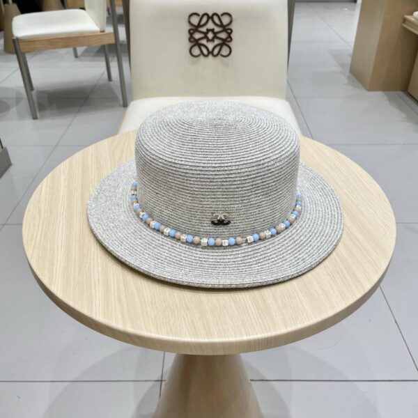 replica,repliche,fake,1:1,earrings,bracelet,ring,jewelry Il nuovo cappello di paglia in stile etnico di Chanel, tendenza della moda estiva da donna, cappello di protezione solare per esterni