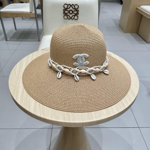 replica,repliche,fake,1:1,earrings,bracelet,ring,jewelry Nuovo cappello a cilindro di Chanel in paglia a tesa larga