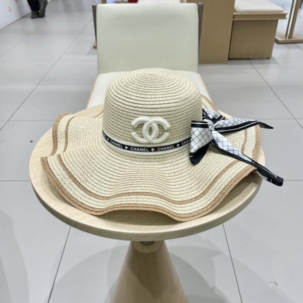 replica,repliche,fake,1:1,earrings,bracelet,ring,jewelry Cappello da sole Chanel in paglia con bordo ondulato