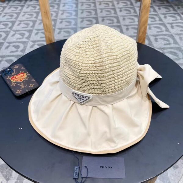 replica,repliche,fake,1:1,earrings,bracelet,ring,jewelry Cappello in vinile PRADA da donna, cappello di protezione solare anti-UV da viaggio primaverile ed estivo, cappello da pescatore con fiocco a tesa larga