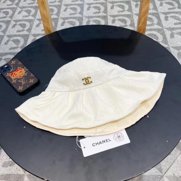 replica,repliche,fake,1:1,earrings,bracelet,ring,jewelry Cappello da sole in tessuto stile cinese CHANEL con fiocco, cappello da pescatore vuoto