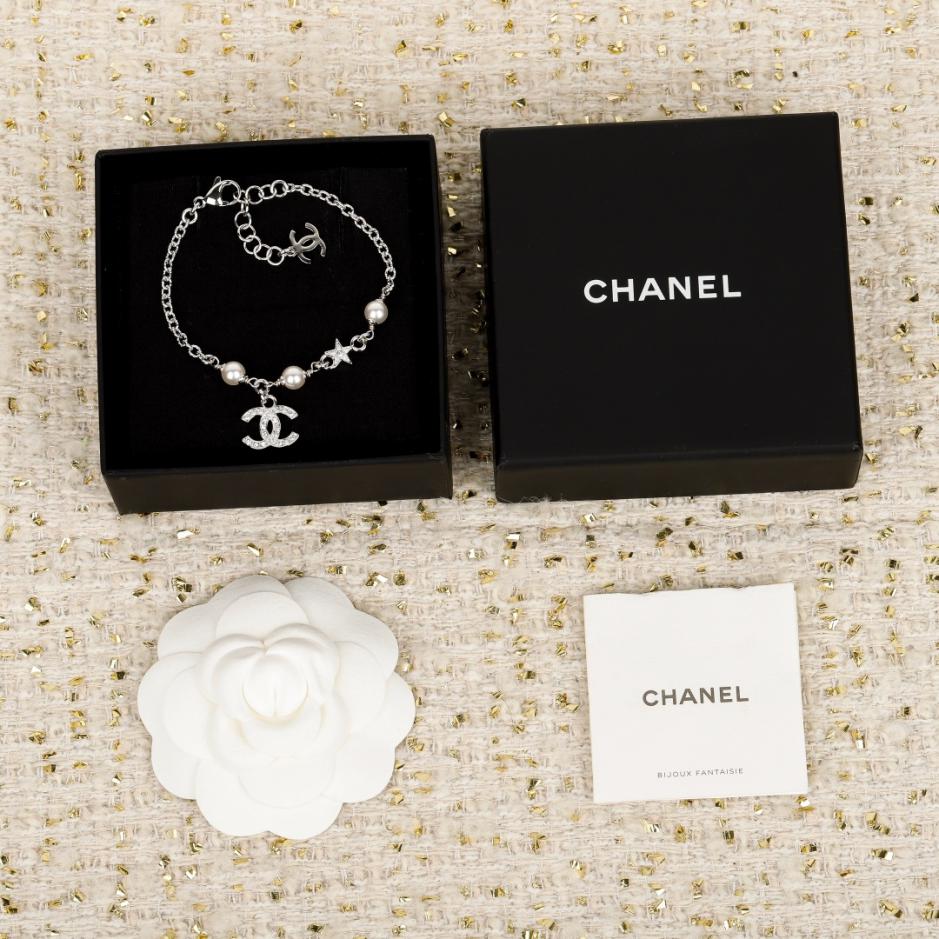 replica,repliche,fake,1:1,earrings,bracelet,ring,jewelry Bracciale Chanel con doppia C e stella a cinque punte e perle (8X4HT) replica,repliche,fake,1:1,earrings,bracelet,ring,jewelry Bracciale Chanel con doppia C e stella a cinque punte e perle (8X4HT)