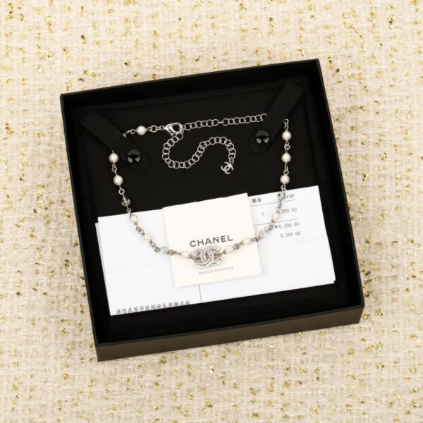 replica,repliche,fake,1:1,earrings,bracelet,ring,jewelry Collana girocollo di perle con diamanti e doppia C Chanel (OJC9I)