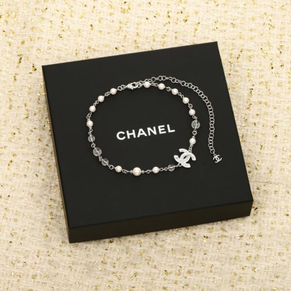 replica,repliche,fake,1:1,earrings,bracelet,ring,jewelry Collana girocollo di perle con diamanti Double C di Chanel (TA9O1)