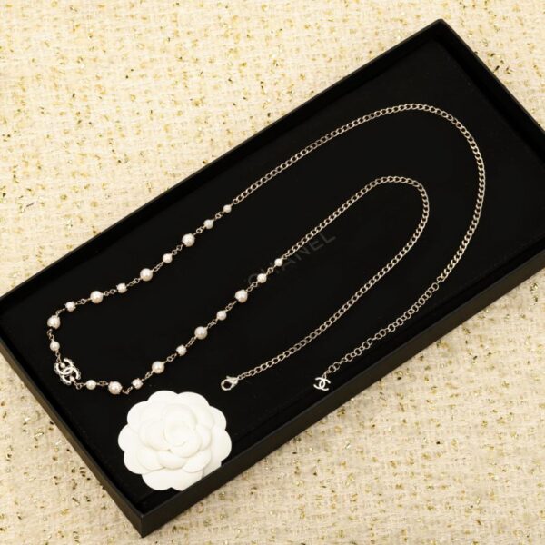 replica,repliche,fake,1:1,earrings,bracelet,ring,jewelry Collana Chanel in pizzo nero con doppia C bianca e perle (IP5JO)