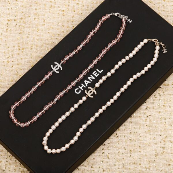 replica,repliche,fake,1:1,earrings,bracelet,ring,jewelry Collana con fiocco e perle rosa Chanel 23 (X38DT)