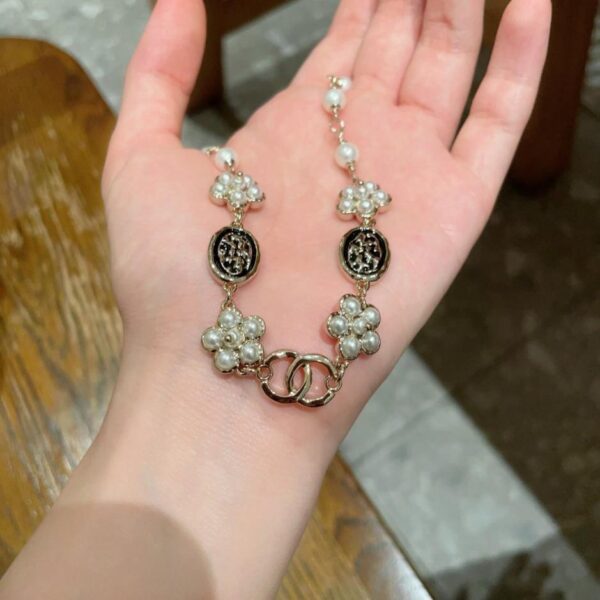 Collana vintage con lettere Chanel (FMIUW)