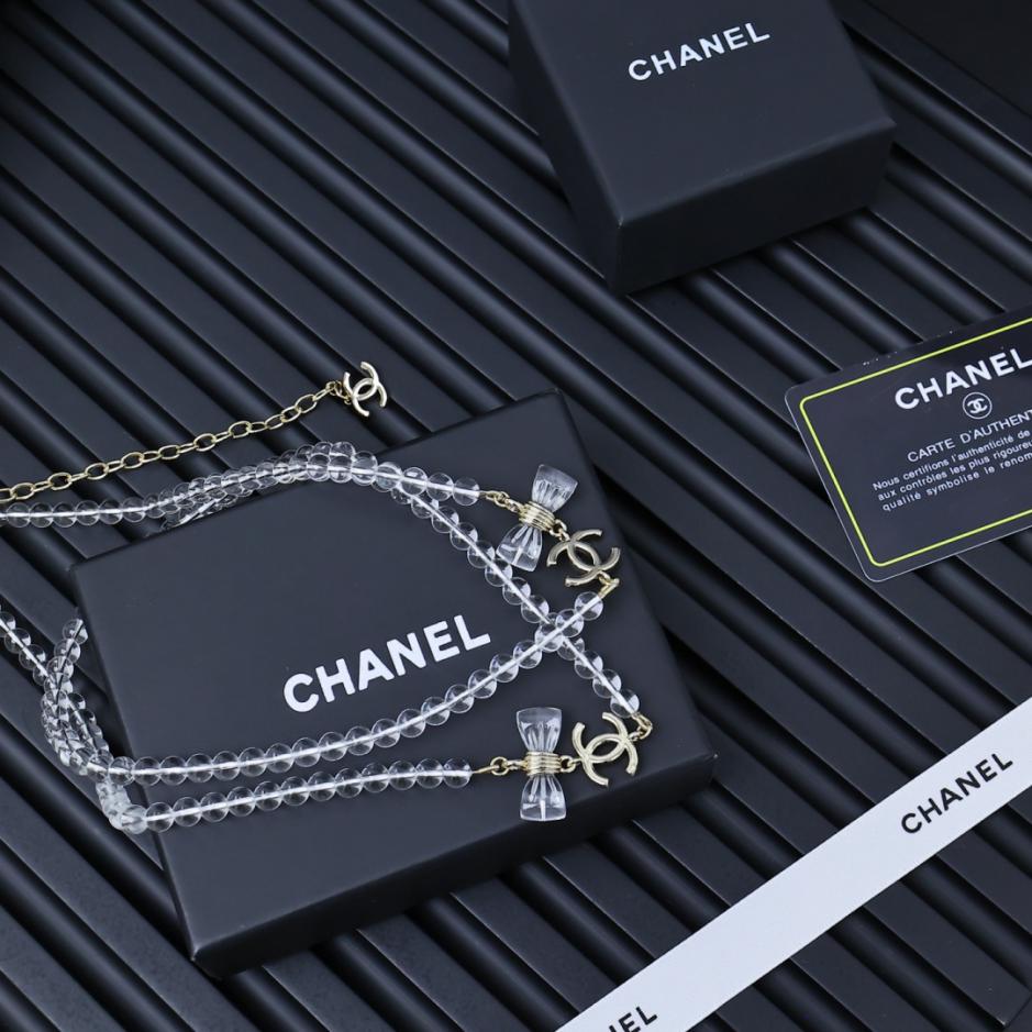 replica,repliche,fake,1:1,earrings,bracelet,ring,jewelry Catena per maglione Chanel con doppio fiocco in acrilico trasparente da 25 pence (KL8UG) replica,repliche,fake,1:1,earrings,bracelet,ring,jewelry Catena per maglione Chanel con doppio fiocco in acrilico trasparente da 25 pence (KL8UG)