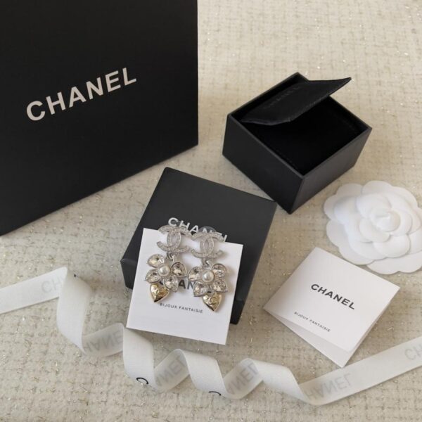 Nuovi orecchini Chanel in oro 24k con cuore di pesca e spiga di grano in occhio di cavallo (KPUX6)