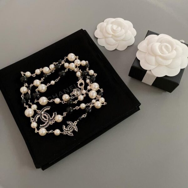 replica,repliche,fake,1:1,earrings,bracelet,ring,jewelry Catena lunga Chanel con doppia C nera effetto petrolio e goccia classica in petrolio (Z3Y8Z)