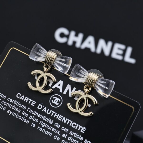 Orecchini Chanel con fiocco trasparente in acrilico da 25 pence (ZPGG7)