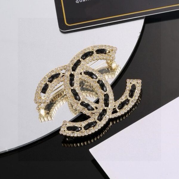 replica,repliche,fake,1:1,earrings,bracelet,ring,jewelry Spilla Chanel (9LCWF)