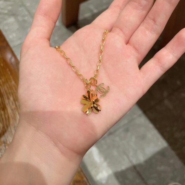 replica,repliche,fake,1:1,earrings,bracelet,ring,jewelry Collana vintage Chanel. (K6V4R)