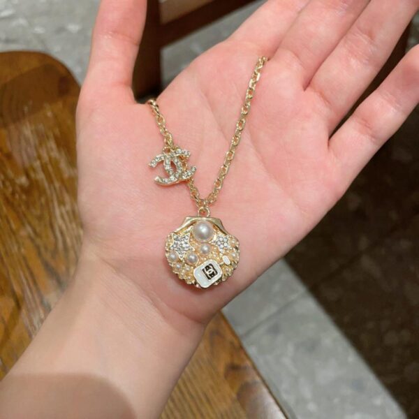 replica,repliche,fake,1:1,earrings,bracelet,ring,jewelry Collana vintage con lettera Chanel (9ISI7)