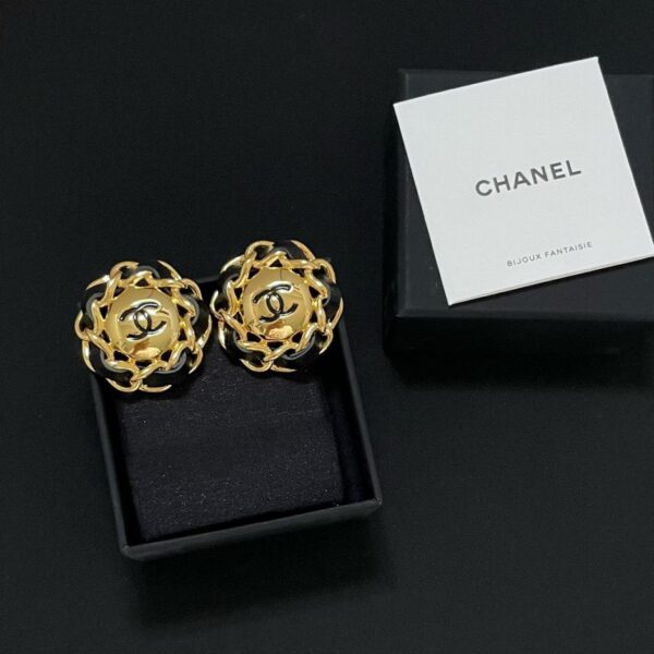 Orecchini Chanel in pelle nera intrecciata, modello vintage (VOCHC)