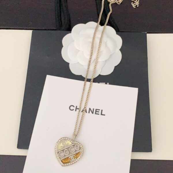 replica,repliche,fake,1:1,earrings,bracelet,ring,jewelry L’ultima collana bicolore Love Coco di Chanel è realizzata in ottone ZP (FXKEB)