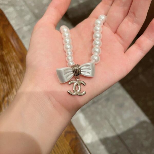 replica,repliche,fake,1:1,earrings,bracelet,ring,jewelry Collana vintage Chanel. (CUIM1)