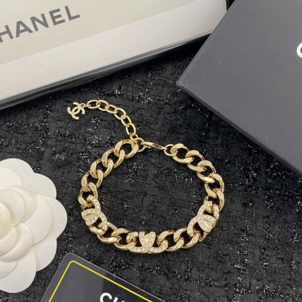 replica,repliche,fake,1:1,earrings,bracelet,ring,jewelry Bracciale CHANEL 22 con catena a doppia C e mezzo diamante (THF0M)