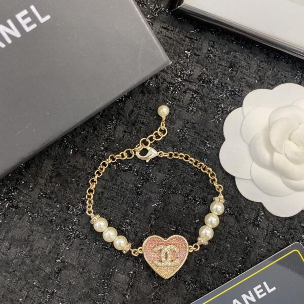 replica,repliche,fake,1:1,earrings,bracelet,ring,jewelry Bracciale CHANEL 22A in oro chiaro con perle a forma di cuore e diamanti rosa sfumati (S6CZ8)