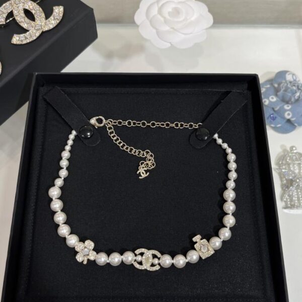 replica,repliche,fake,1:1,earrings,bracelet,ring,jewelry Collana di perle Chanel New Star Crystal Double C da 25 penny, girocollo, flacone di profumo + quadrifoglio portafortuna + cristallo CC (QJAEZ)