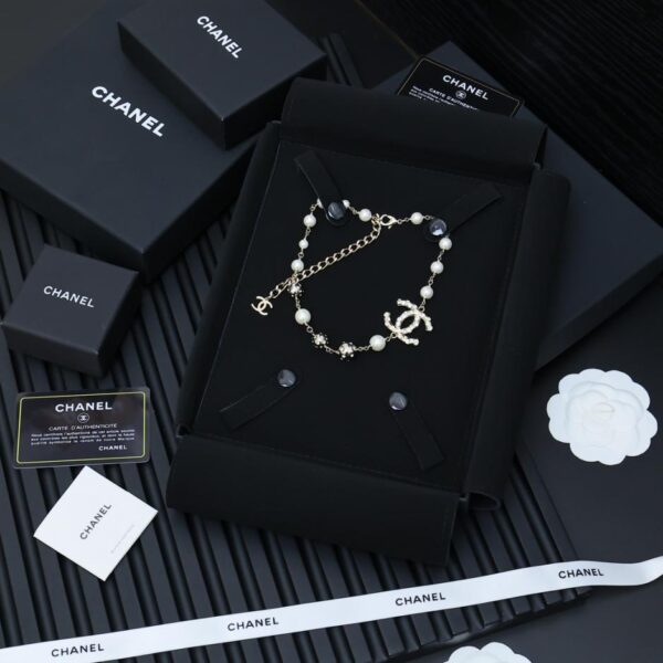 replica,repliche,fake,1:1,earrings,bracelet,ring,jewelry Collana di perle Chanel Double C (QDMT6)
