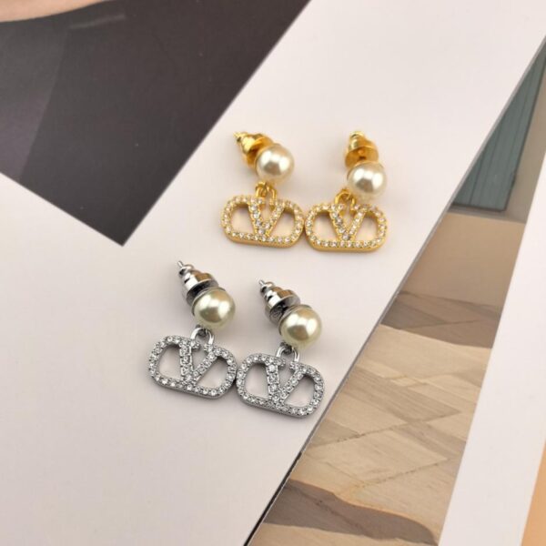 replica,repliche,fake,1:1,earrings,bracelet,ring,jewelry Orecchini Valentino in oro (1CTCF)