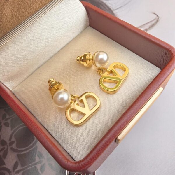 replica,repliche,fake,1:1,earrings,bracelet,ring,jewelry Orecchini a bottone Valentino in oro (R9HMX)