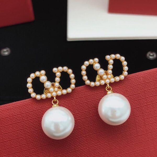 replica,repliche,fake,1:1,earrings,bracelet,ring,jewelry Orecchini pendenti con perle di riso Valentino, ultimo modello, materiale in ottone ZP (UFM4N)