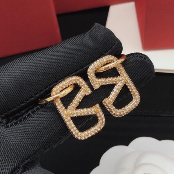 replica,repliche,fake,1:1,earrings,bracelet,ring,jewelry Ciondolo a gancio per orecchio Valentino con lettera V e diamante (EG36D)