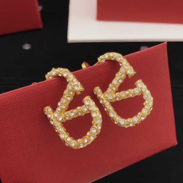 replica,repliche,fake,1:1,earrings,bracelet,ring,jewelry Orecchini Valentino modello ultimo con diamanti, materiale ottone ZP di medie dimensioni (EMZHW)