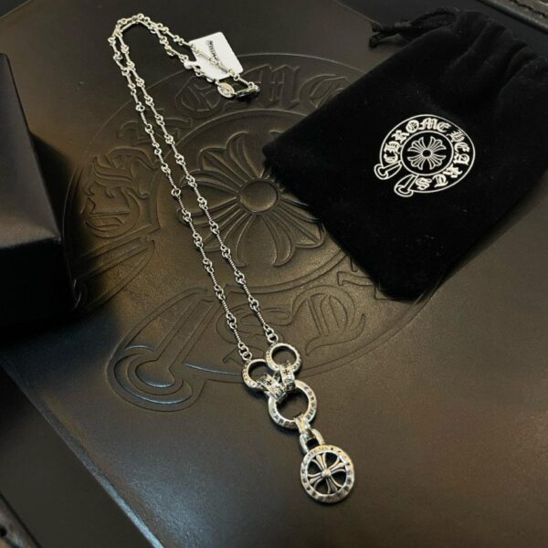 replica,repliche,fake,1:1,earrings,bracelet,ring,jewelry Nuova collana retrò classica in bambù con ciondolo a tre anelli Chrome Hearts di qualità da banco (TNIAO)