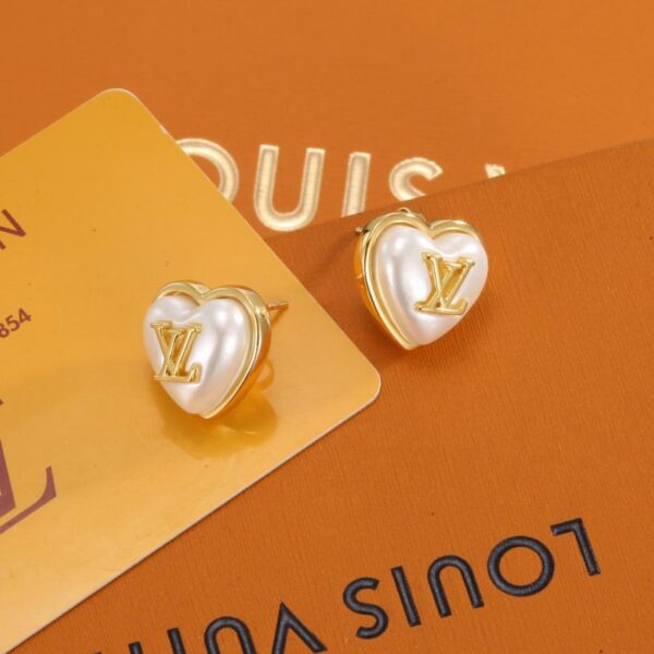 replica,repliche,fake,1:1,earrings,bracelet,ring,jewelry Orecchini Louis Vuitton Heart in resina color pesca (CJDOO)
