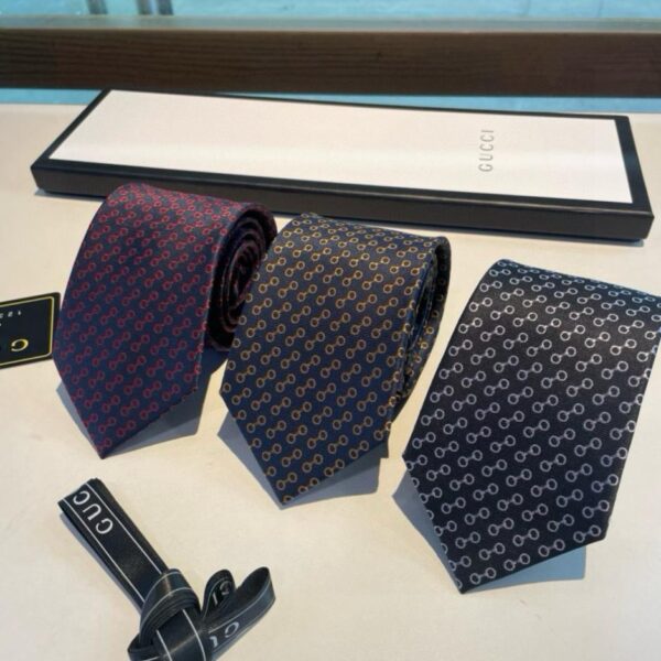 replica,repliche,fake,1:1,earrings,bracelet,ring,jewelry Cravatta Gucci da uomo nuova (LEFA4)