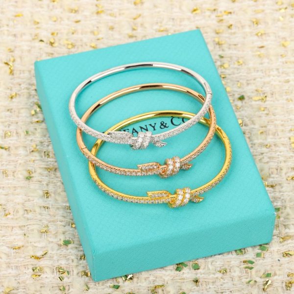 replica,repliche,fake,1:1,earrings,bracelet,ring,jewelry Contatore / Bracciale rigido intrecciato con diamanti, personalizzabile con oro vero e diamanti, della serie Tiffany Knot (MZEHM).