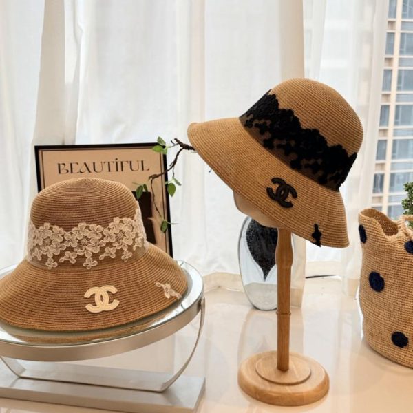 replica,repliche,fake,1:1,earrings,bracelet,ring,jewelry Cappello da pescatore in paglia con lacci stile Chanel (06Q0XO)