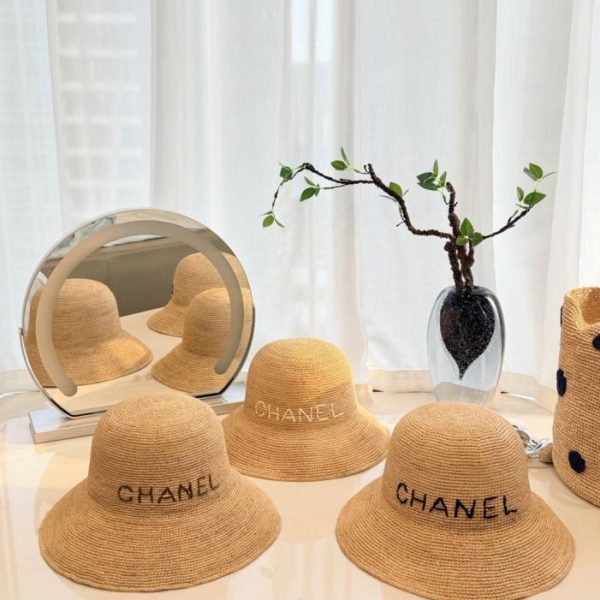 replica,repliche,fake,1:1,earrings,bracelet,ring,jewelry Cappello da pescatore Chanel in paglia intrecciata a mano, rafia naturale lavorata all’uncinetto a mano (L6NBCU)