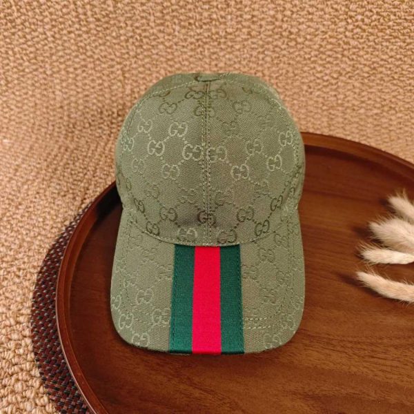 replica,repliche,fake,1:1,earrings,bracelet,ring,jewelry Cappellino da baseball Gucci della collezione Webbing (F7IVGB) – Stesso modello di quello presente sul sito ufficiale.