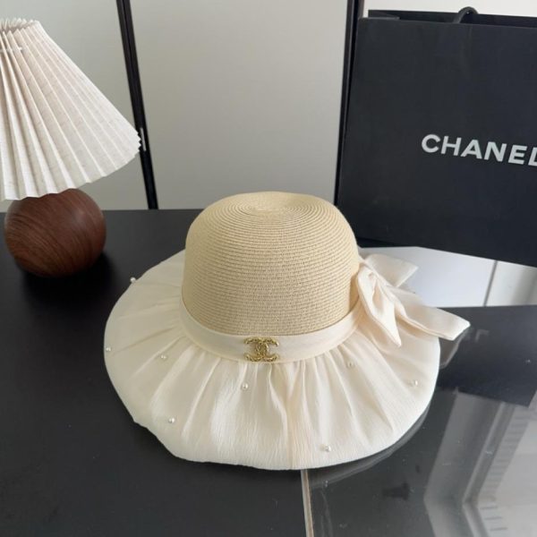 replica,repliche,fake,1:1,earrings,bracelet,ring,jewelry Cappello di paglia Chanel con fiocco patchwork e trecce di alta qualità (EM6TIG)