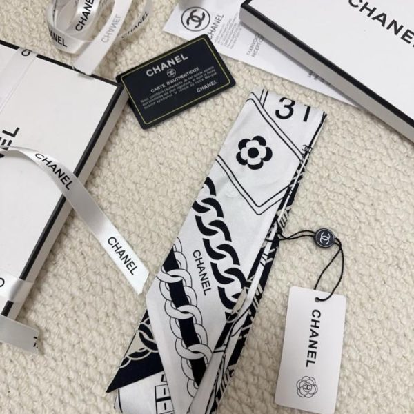 replica,repliche,fake,1:1,earrings,bracelet,ring,jewelry Fascia per capelli con stampa in bianco e nero di Chanel (LWOZKS)